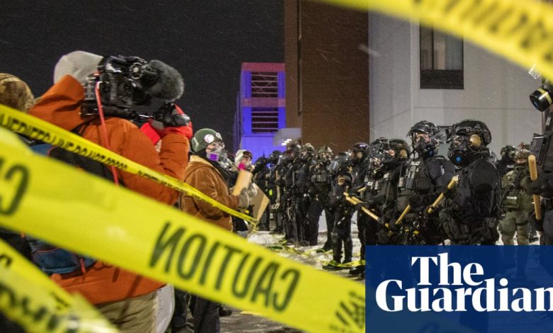 Two agents who shot Minnesota man on leave as Trump says he will ‘de-escalate’ | Minnesota ICE shootings